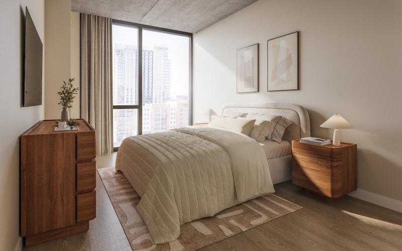 a bedroom with a bed and a dresser