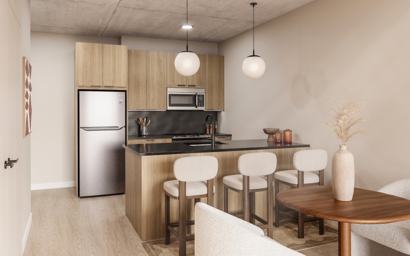 a kitchen with a table and chairs
