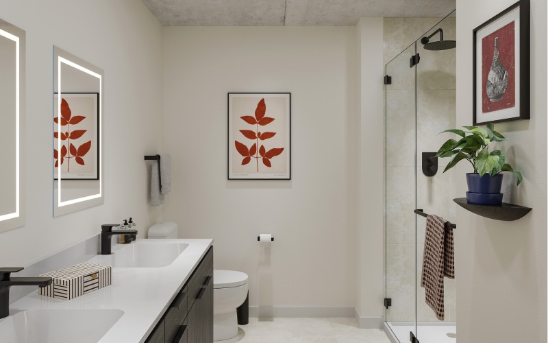 a bathroom with a shower, toilet and a sink