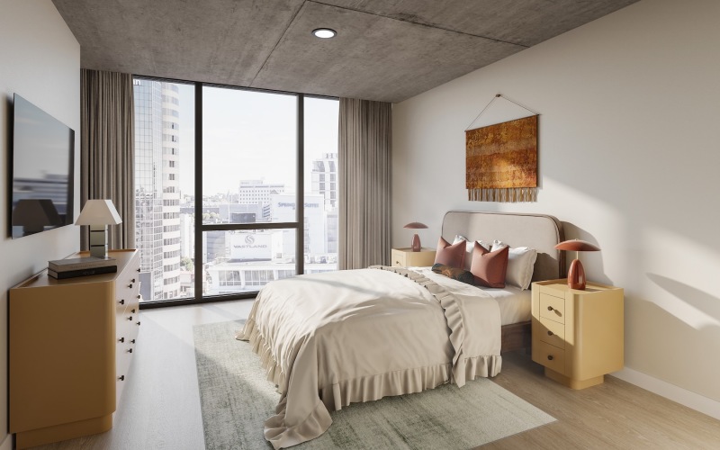 a bedroom with a bed and two nightstands