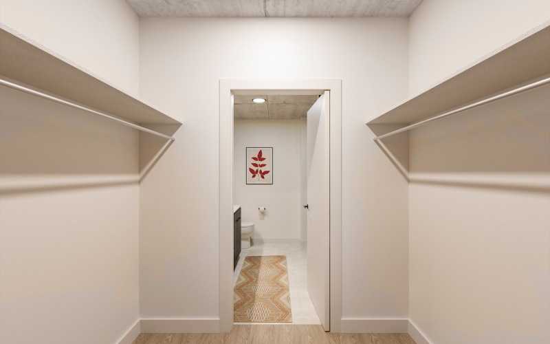 a closet with white walls