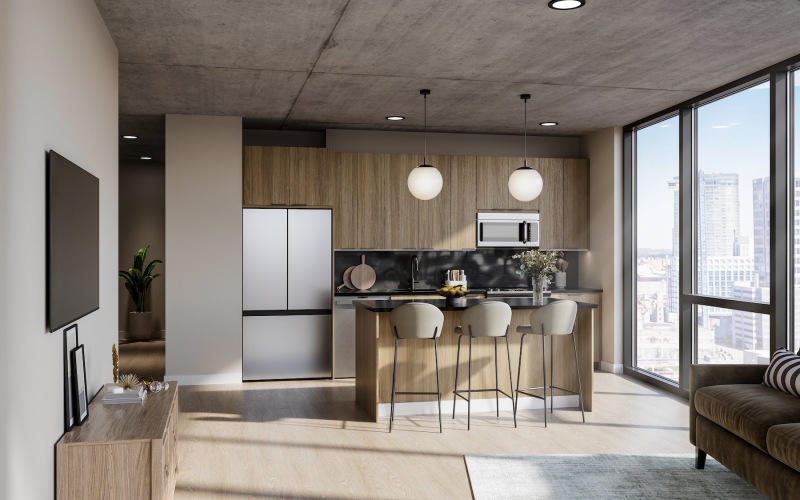 a kitchen with an island and chairs