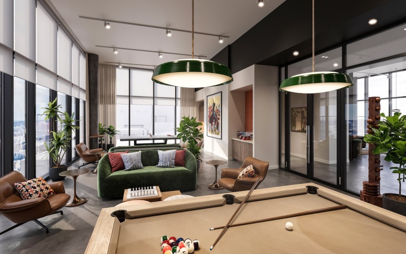 a clubroom with a pool table and a couch