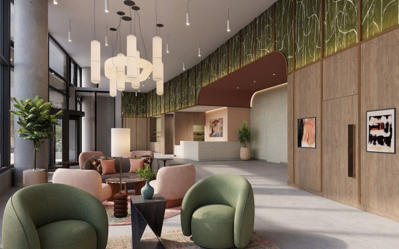 a room with a couch and chairs