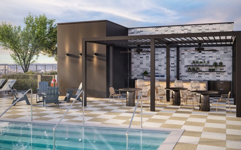 a pool with tables and chairs