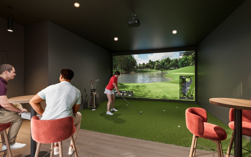 people using a golf simulator