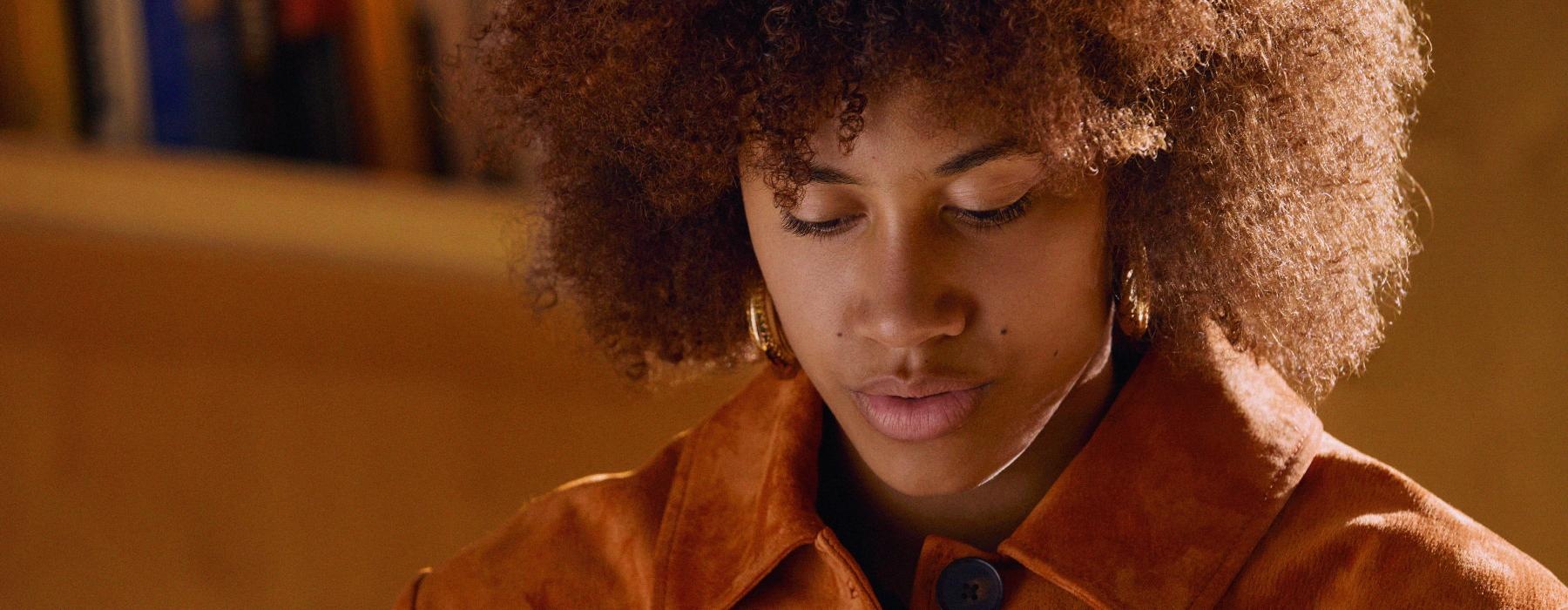 a person with curly hair