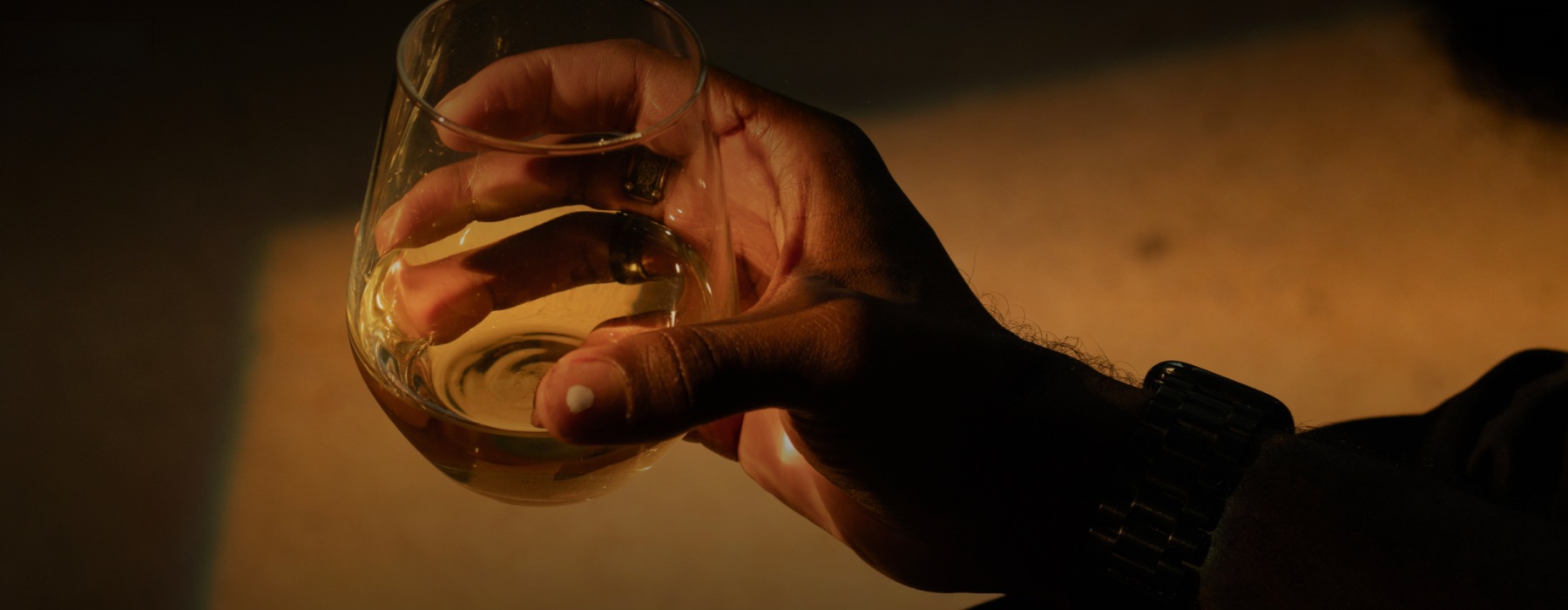 a man holding a wine glass