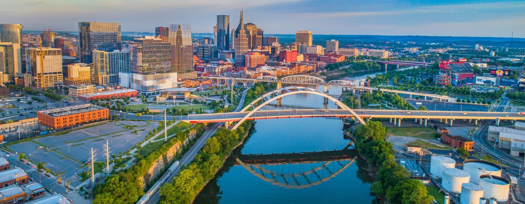 a bridge over a river in a city