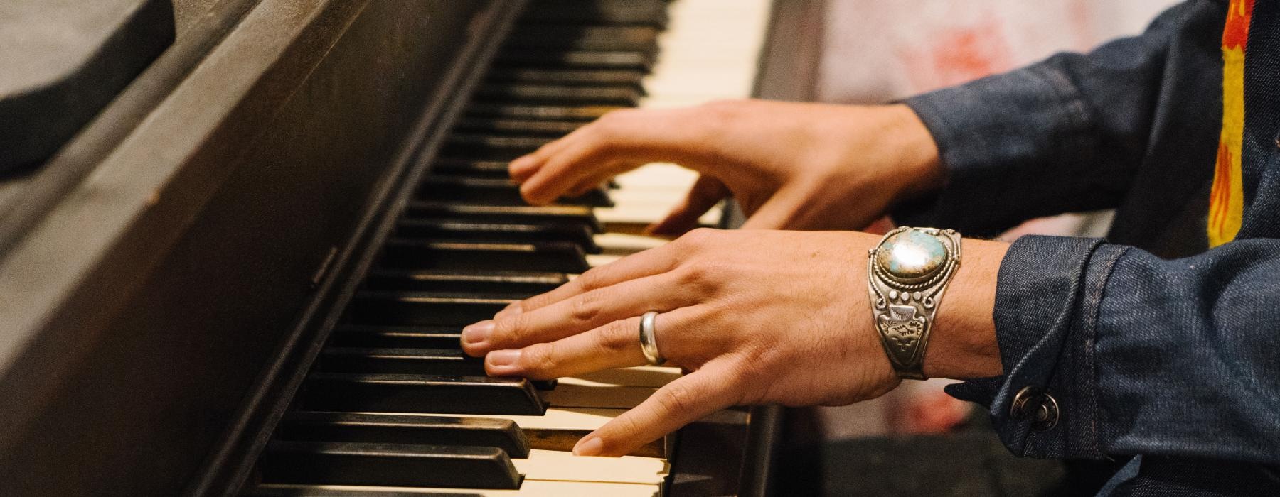 a person playing a piano